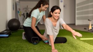 Physio working with patient